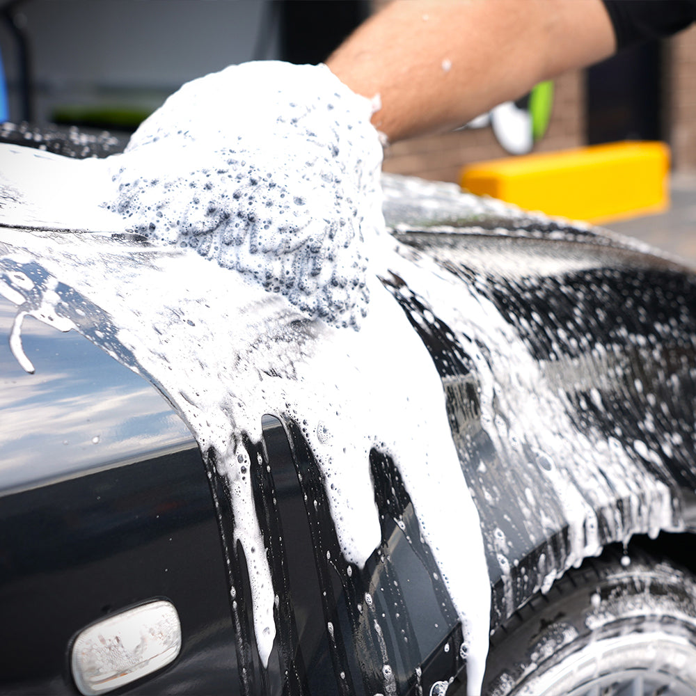 Caress microfibre car wash mitt washing black car