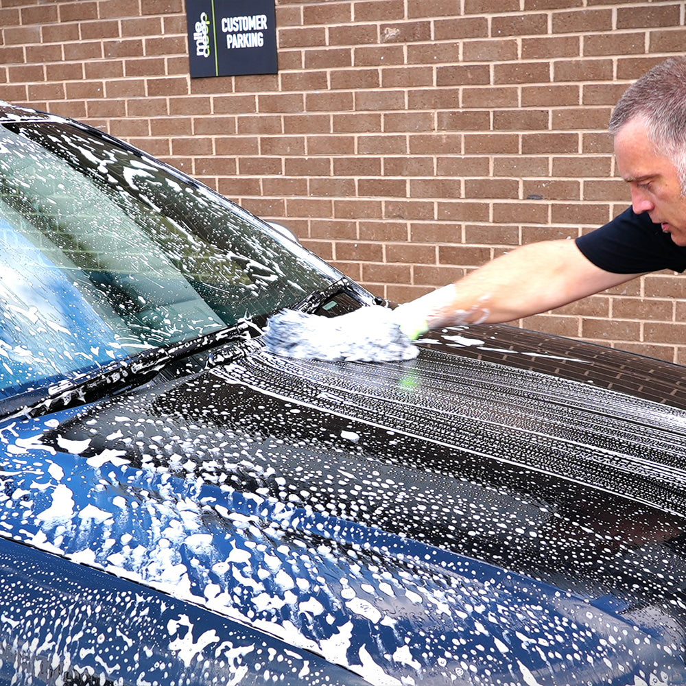 Caress microfibre car wash mitt washing black car