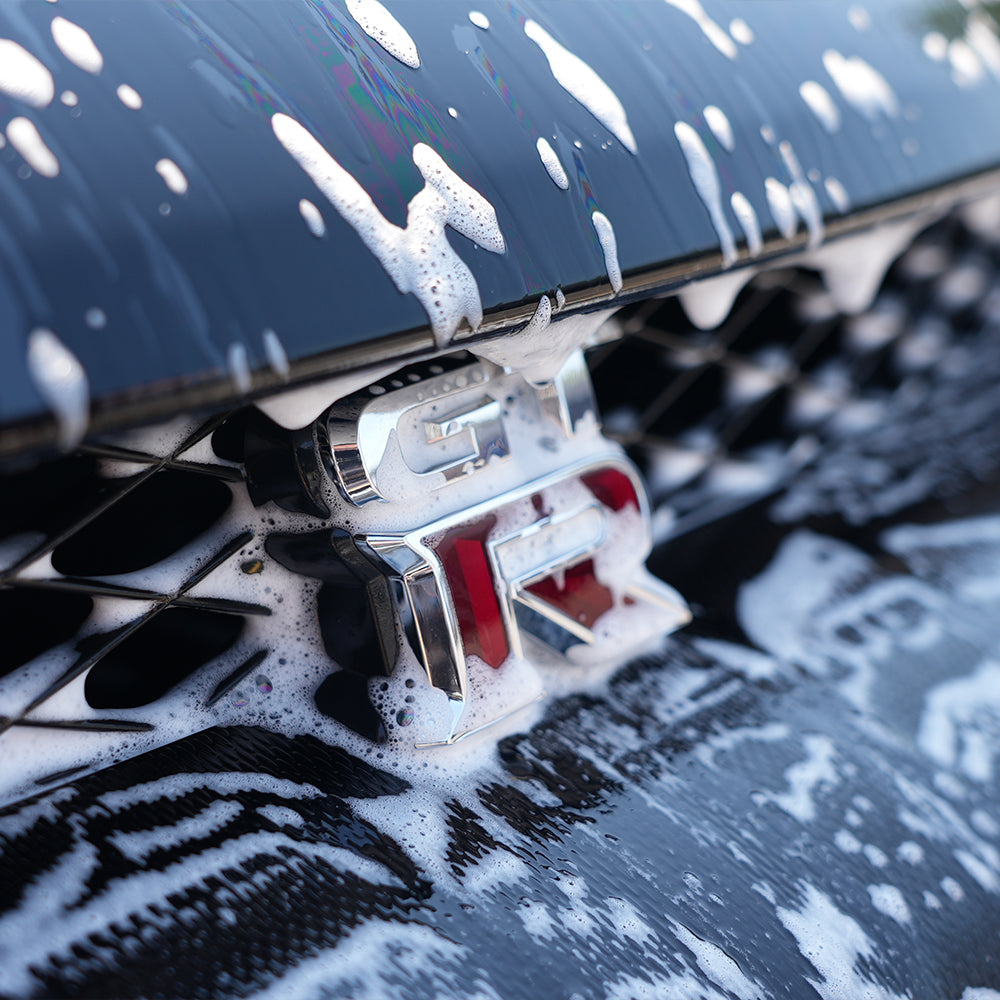 cleanse concentrated ph-neutral car shampoo solution on a GTR car