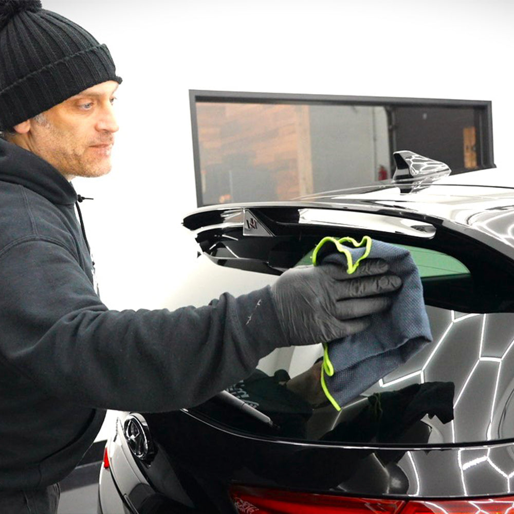 clear fishscale glass cloth for car being used on black car 