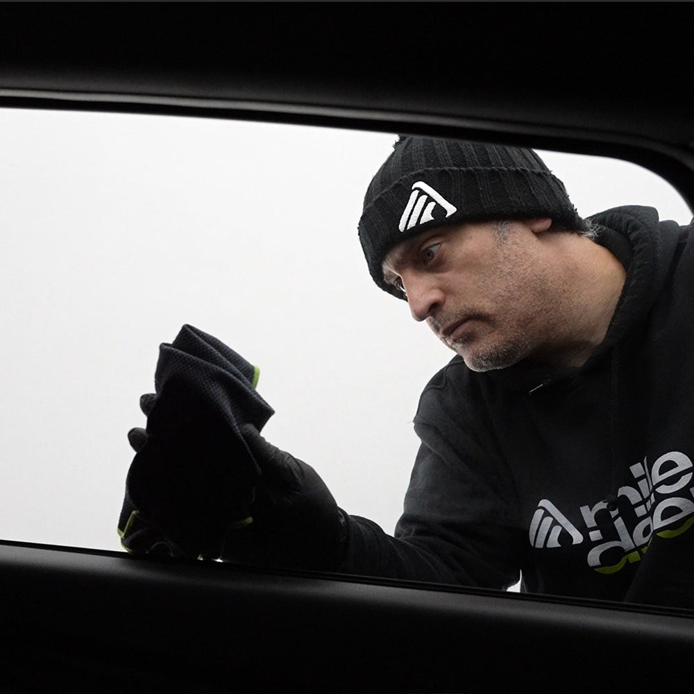 clear fishscale glass cloth for car being used on black car 