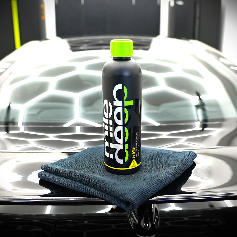 flare ceramic quick detailer on top of black car