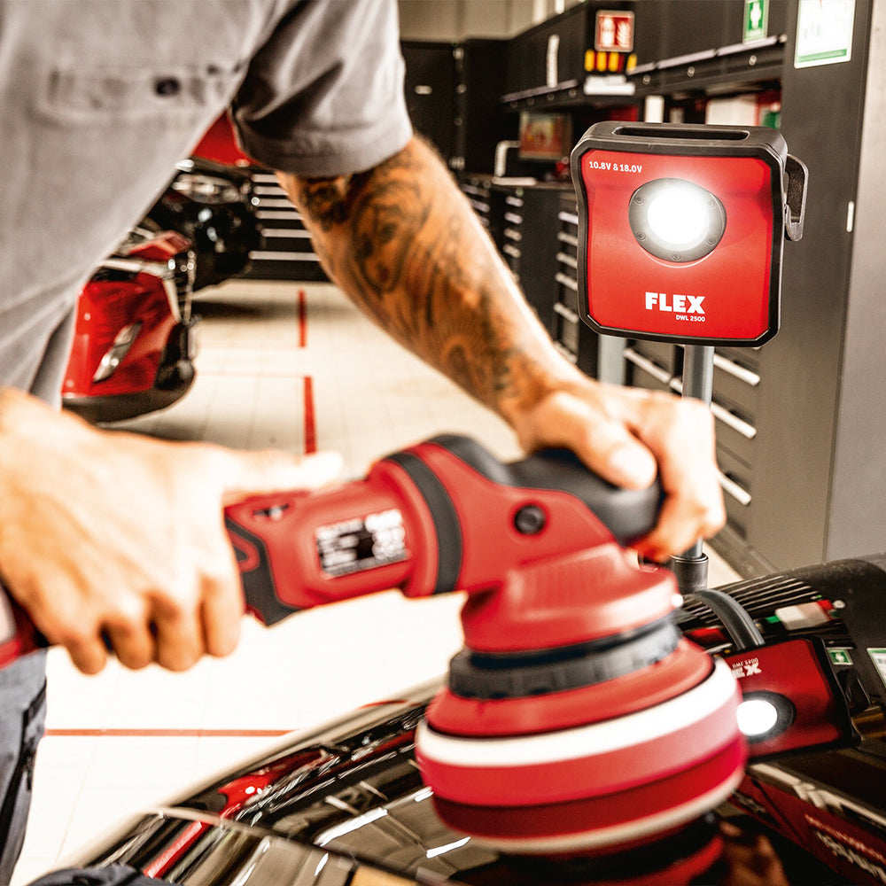 flex dwl 2500 10.8/18 v cordless detailing light being used to shine light on car being detailed