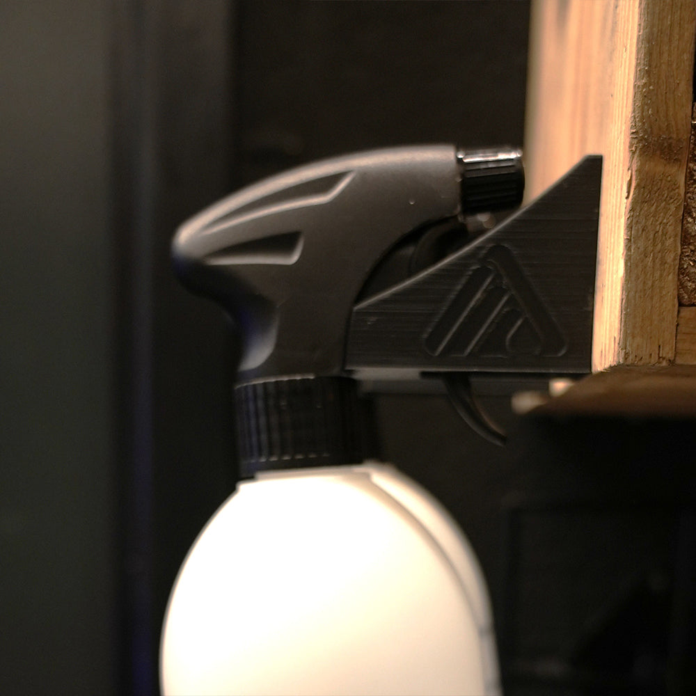 focus + locate close up of spray bottle lids 