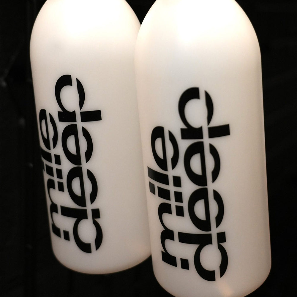 focus + locate plastic car bottle