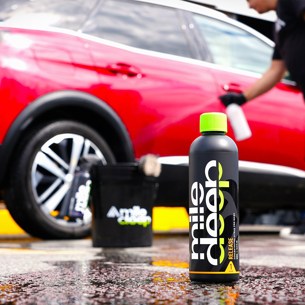 refresh concentrated citrus pre-car wash with red car in background 